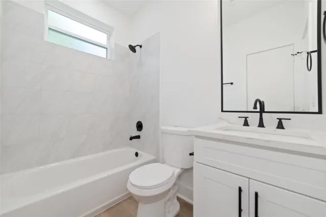 a bathroom with a sink and a bathtub