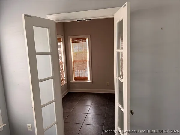 a view of empty room with front door