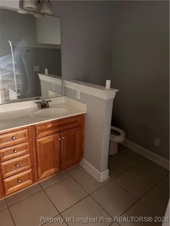 a room with a sink and cabinets