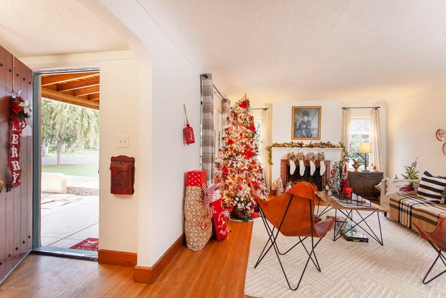 a view of a livingroom with furniture