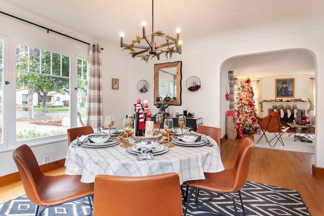 a view of a dining room with furniture window and outside view