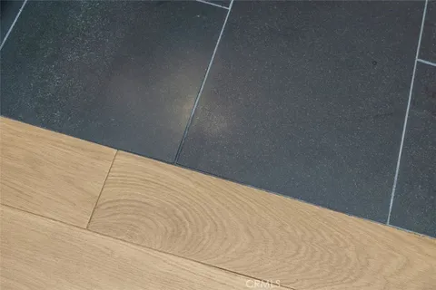 a view of a patio with furniture and plants