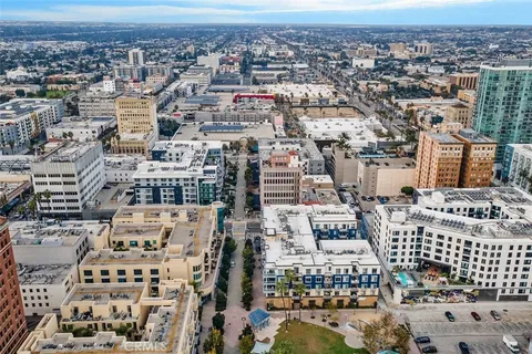 a view of city with tall buildings