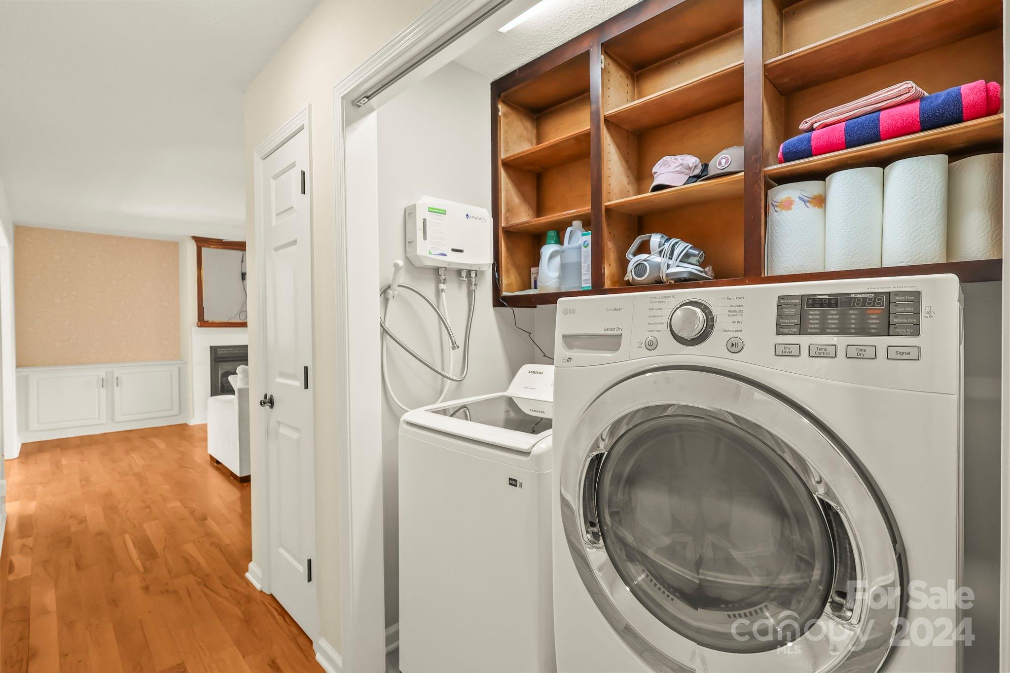 3409 Collettsville Road Lenoir, NC 28645 - Photo 14 of 48 a view of a hallway with washer and dryer