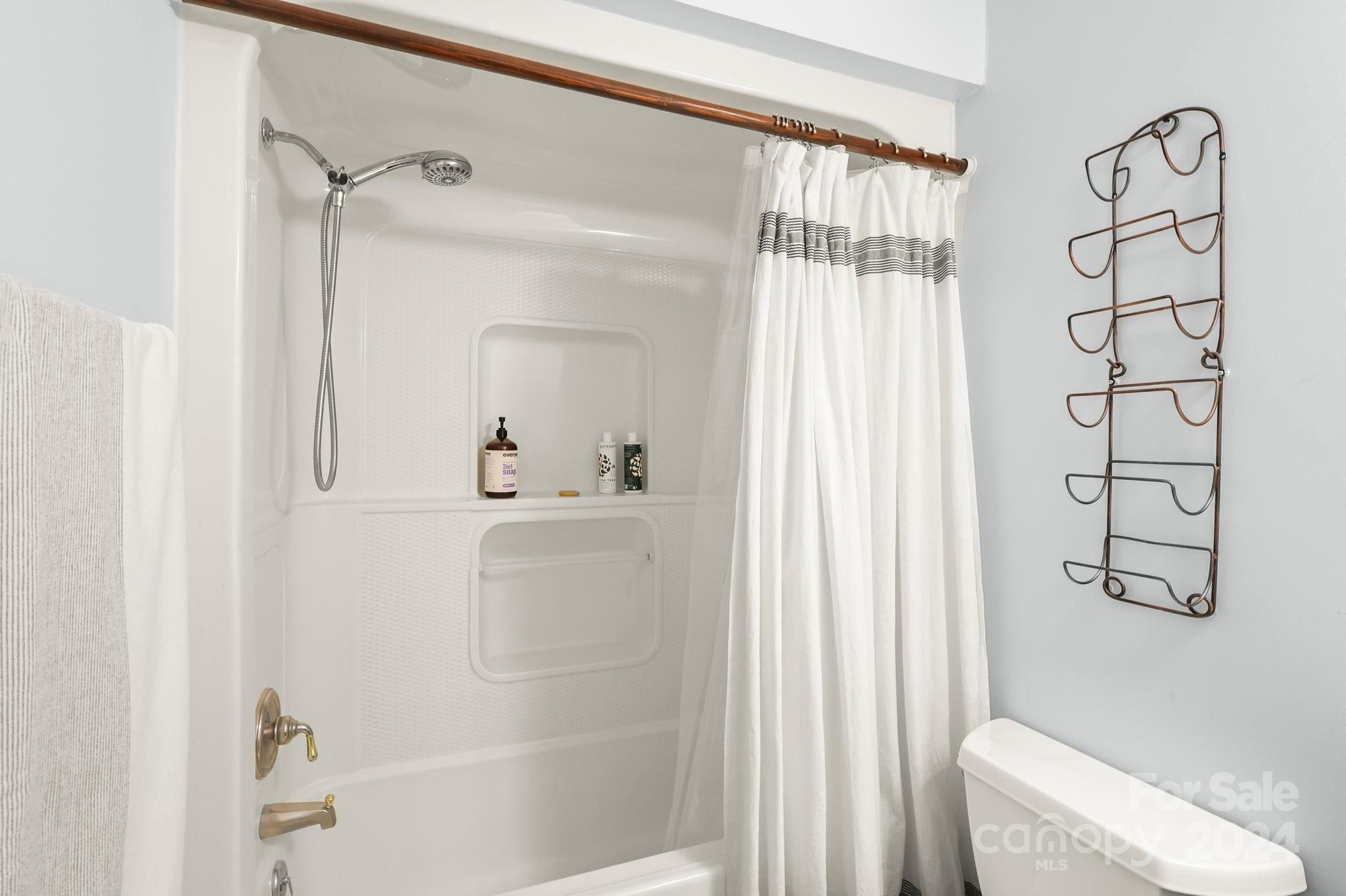 3409 Collettsville Road Lenoir, NC 28645 - Photo 21 of 48 a bathroom with a shower and a sink
