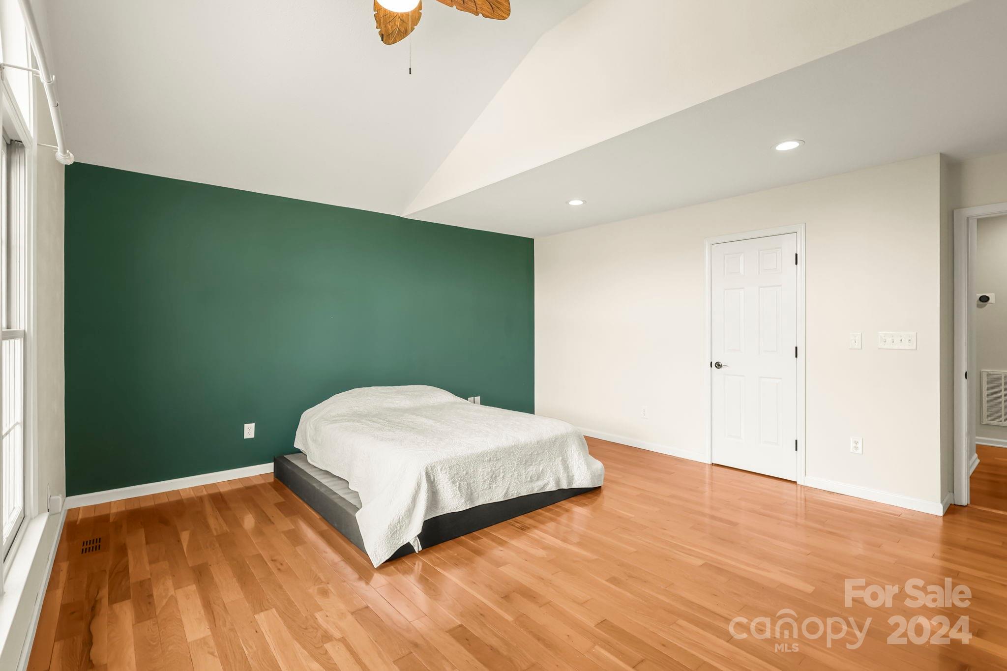 3409 Collettsville Road Lenoir, NC 28645 - Photo 23 of 48 a bedroom with a bed and a painting on the wall
