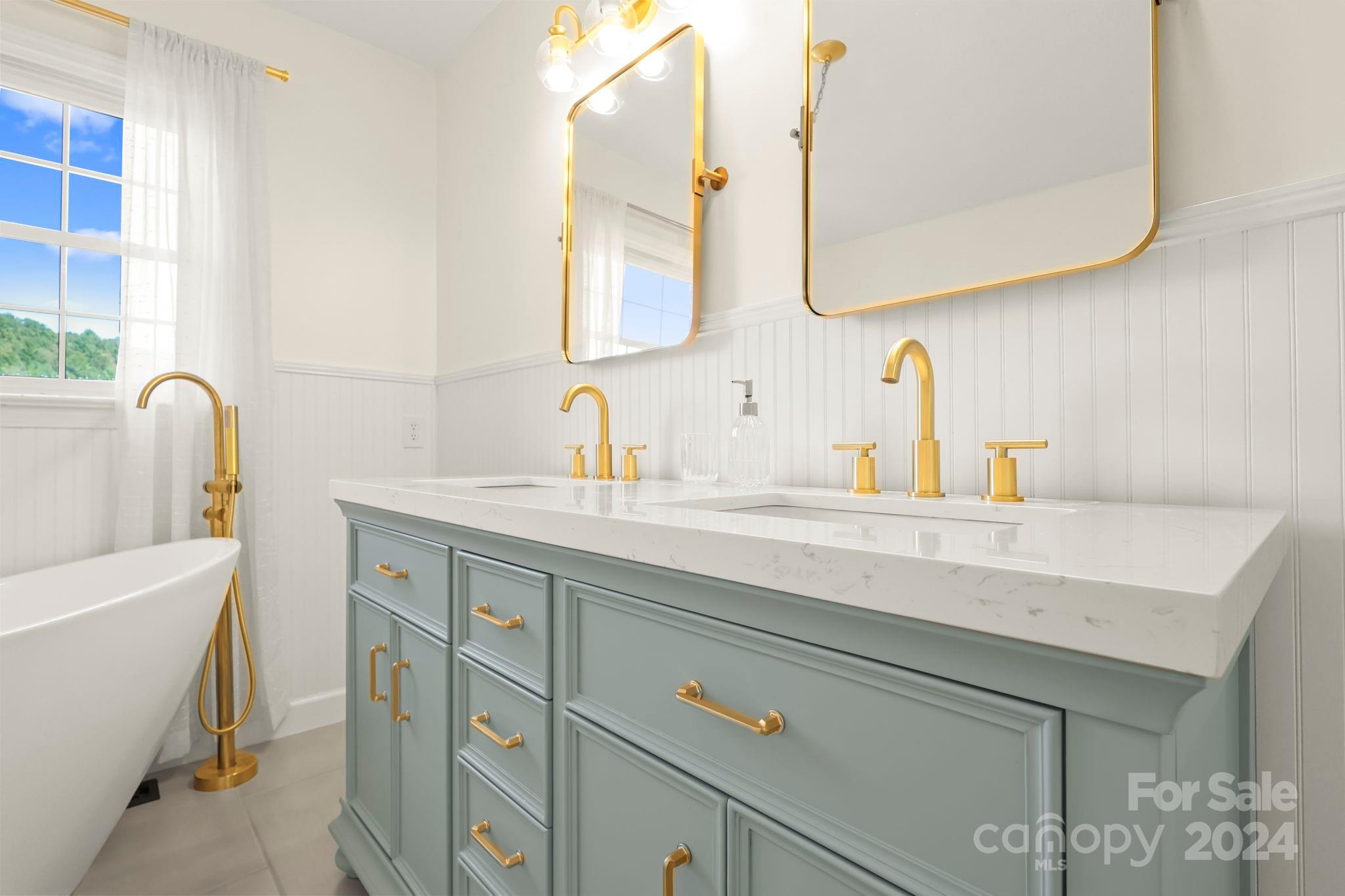 3409 Collettsville Road Lenoir, NC 28645 - Photo 27 of 48 a bathroom with a sink and a mirror