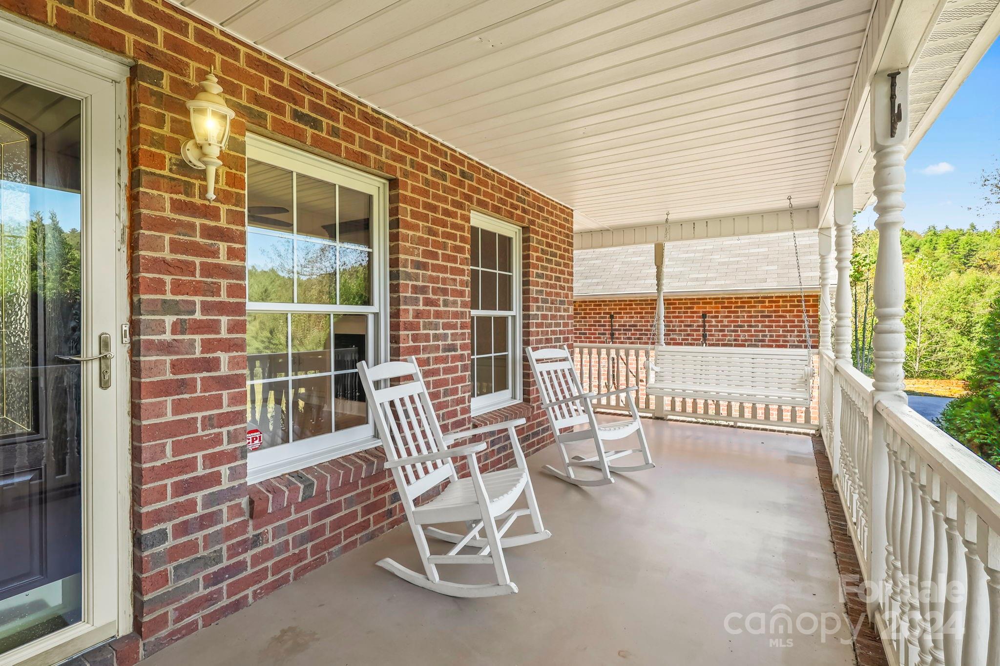 3409 Collettsville Road Lenoir, NC 28645 - Photo 3 of 48 a view of a chair and table in the balcony