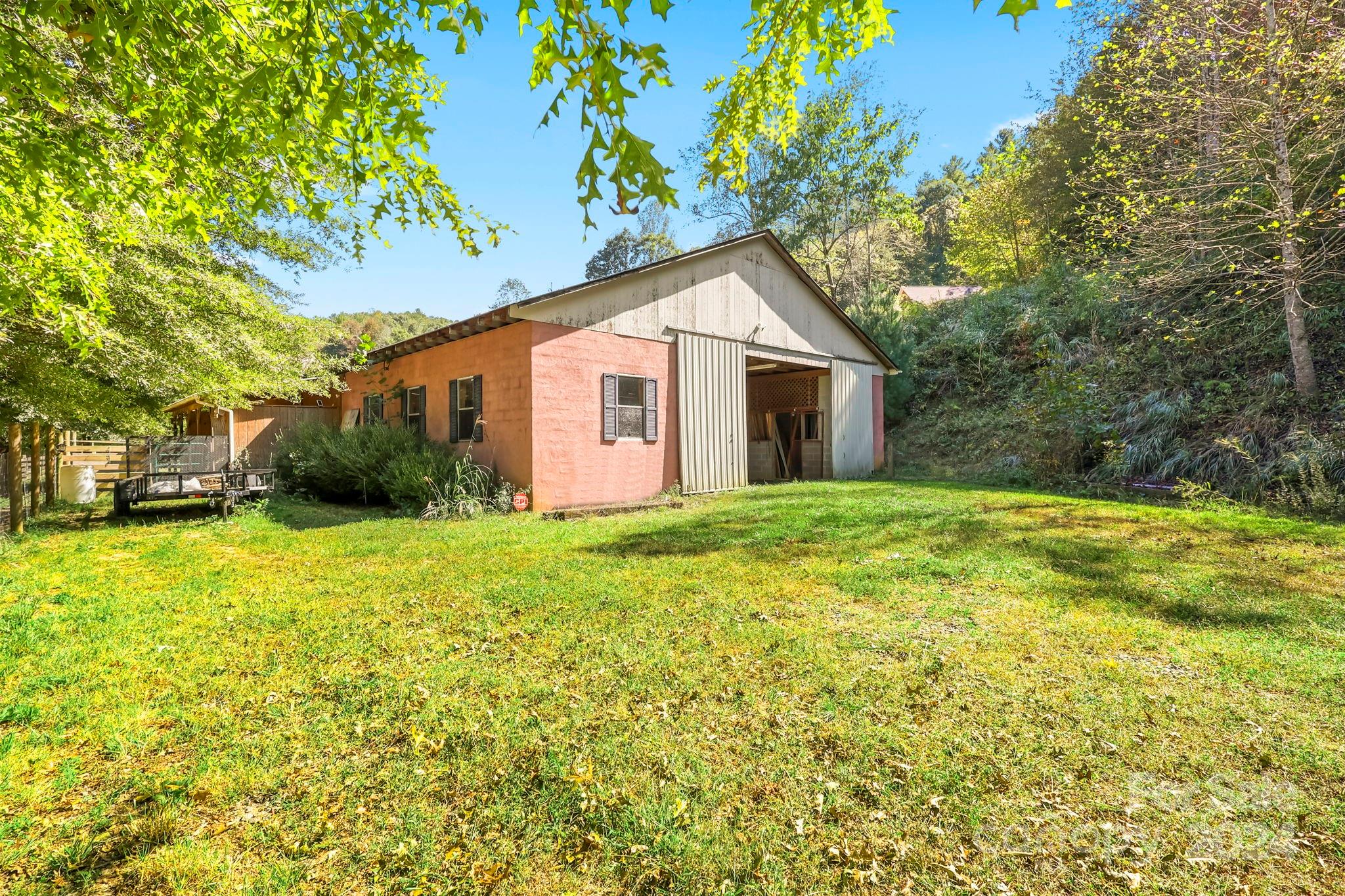 3409 Collettsville Road Lenoir, NC 28645 - Photo 36 of 48 a view of a house with backyard and garden