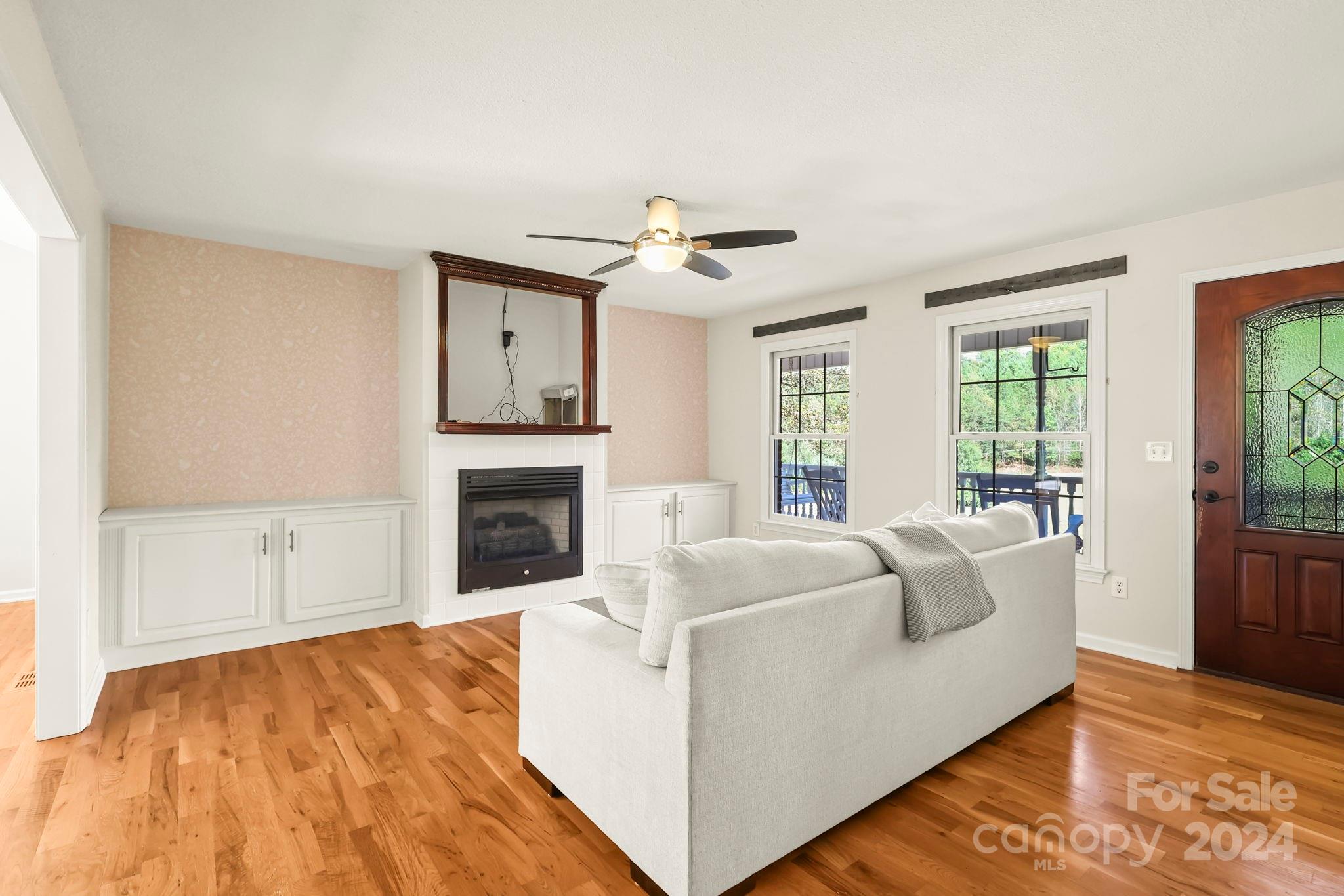 3409 Collettsville Road Lenoir, NC 28645 - Photo 5 of 48 a living room with furniture and a fireplace