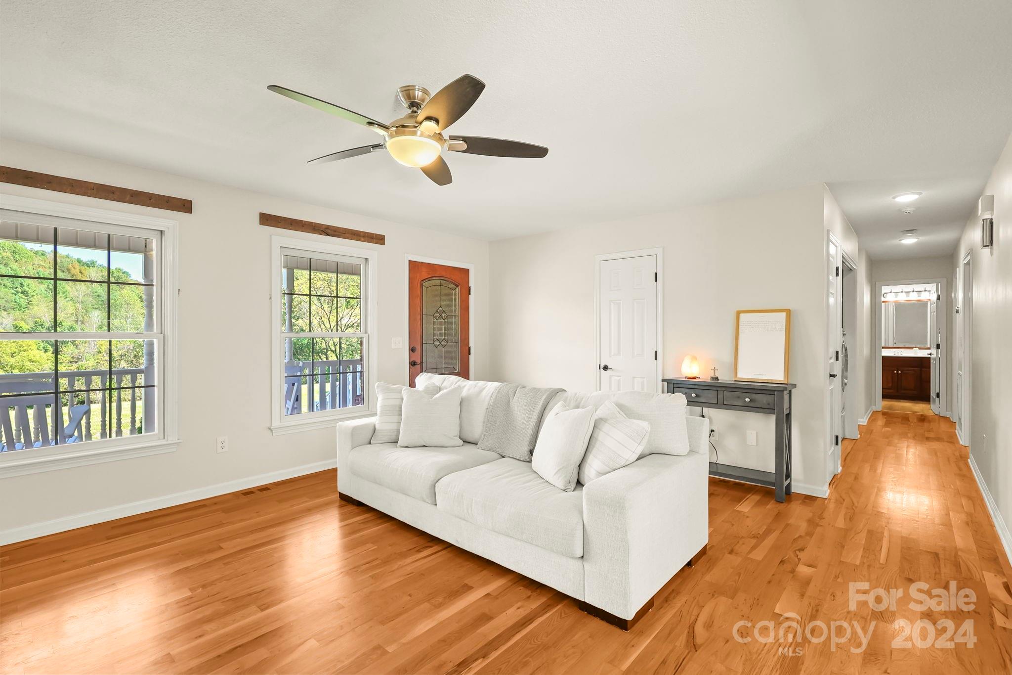 3409 Collettsville Road Lenoir, NC 28645 - Photo 7 of 48 a living room with furniture and a large window