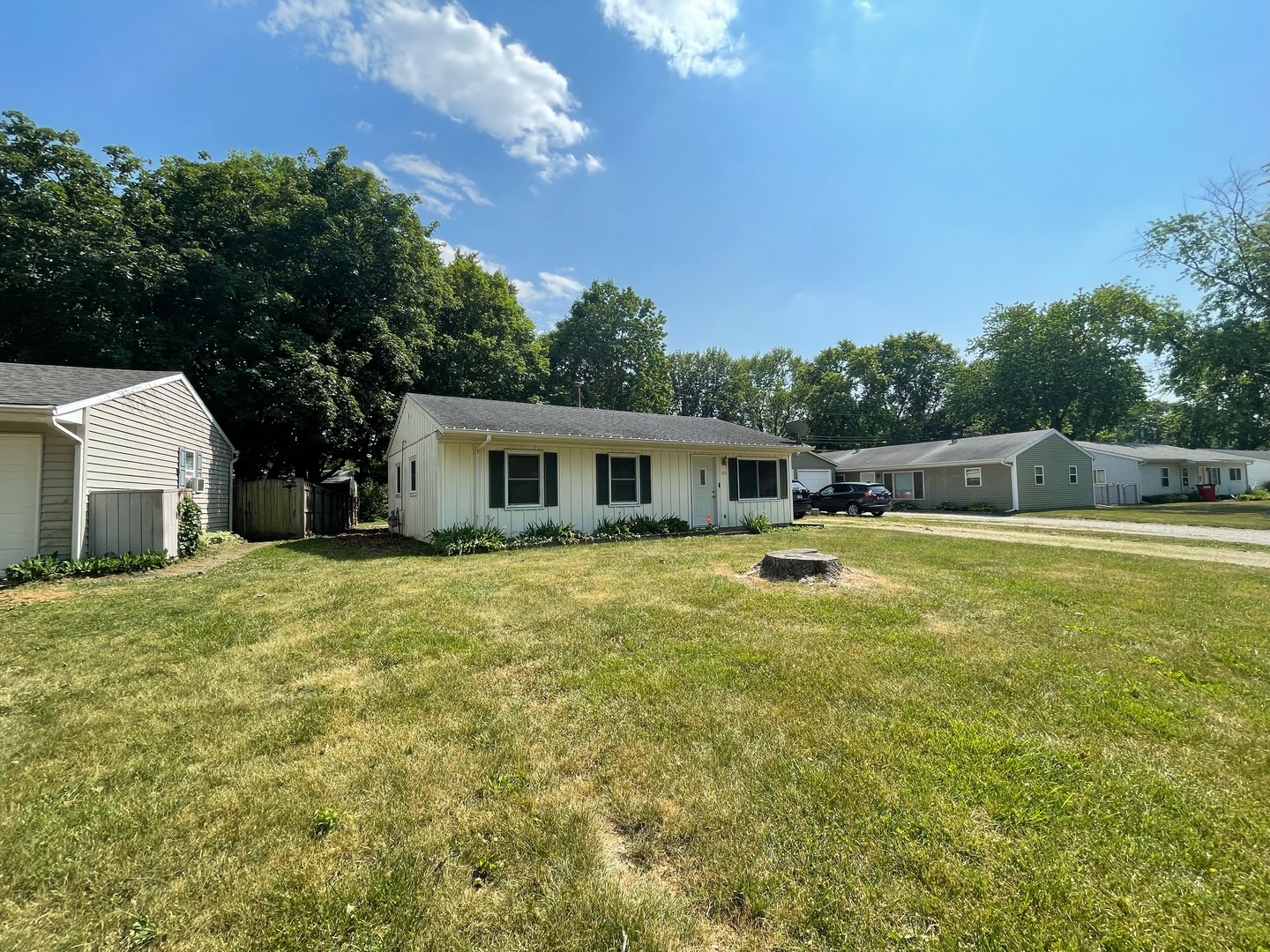 2803 Willowpark Drive Champaign, IL 61821 - Photo 2 of 2 a front view of a house with a garden
