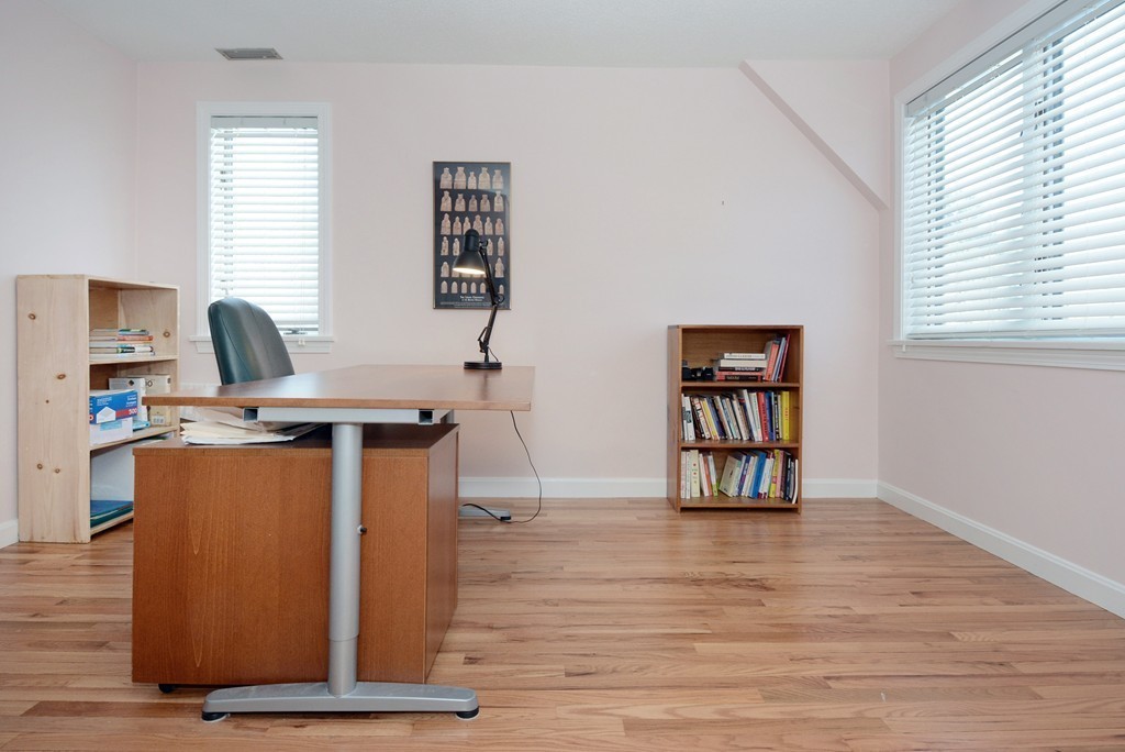 11 Old Nugent Farm Road, Unit 11 Gloucester, MA 01930 - Photo 17 of 30 a view of a workspace with furniture and a window