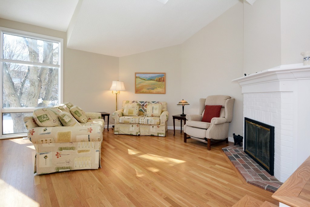 11 Old Nugent Farm Road, Unit 11 Gloucester, MA 01930 - Photo 7 of 30 a living room with furniture window and a fireplace