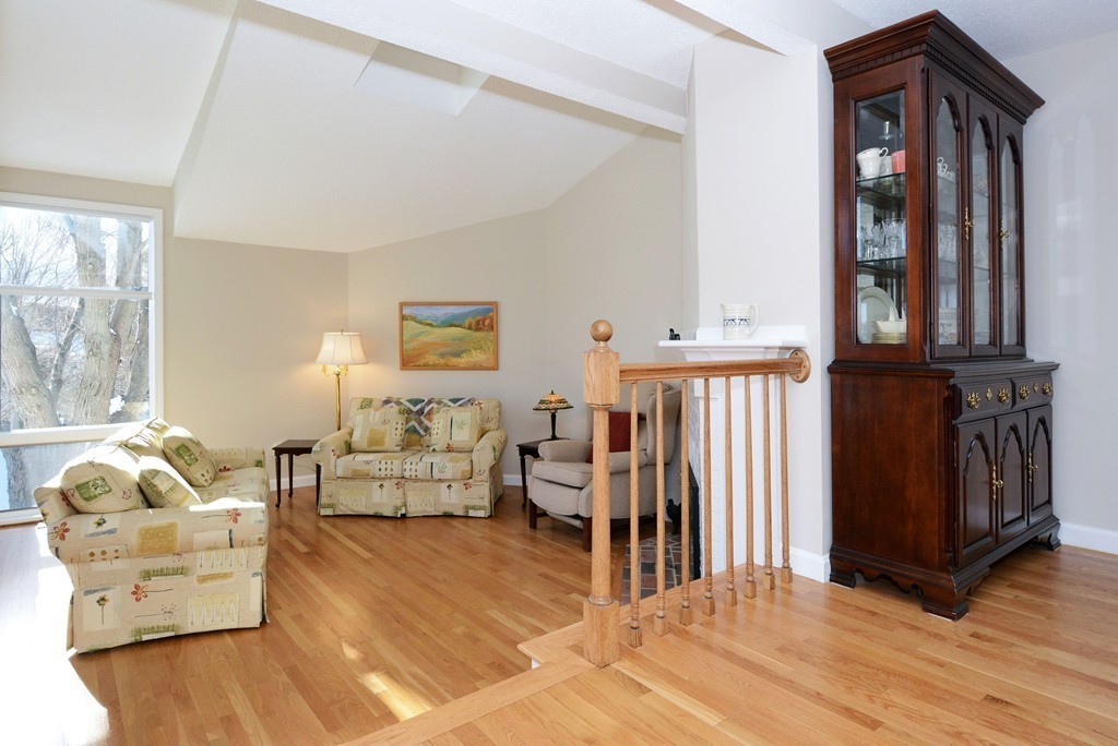 11 Old Nugent Farm Road, Unit 11 Gloucester, MA 01930 - Photo 8 of 30 a living room with furniture and wooden floor