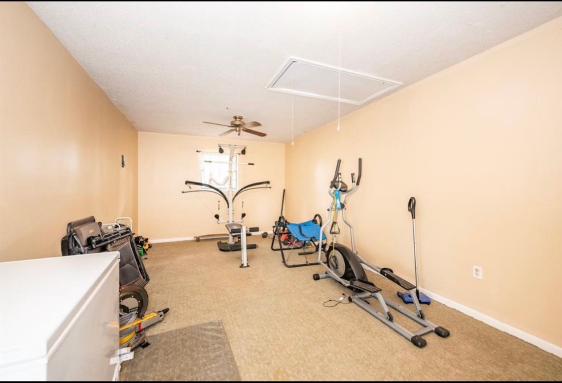 464 River Road Angleton, TX 77515 - Photo 12 of 45 a view of a room with gym equipment