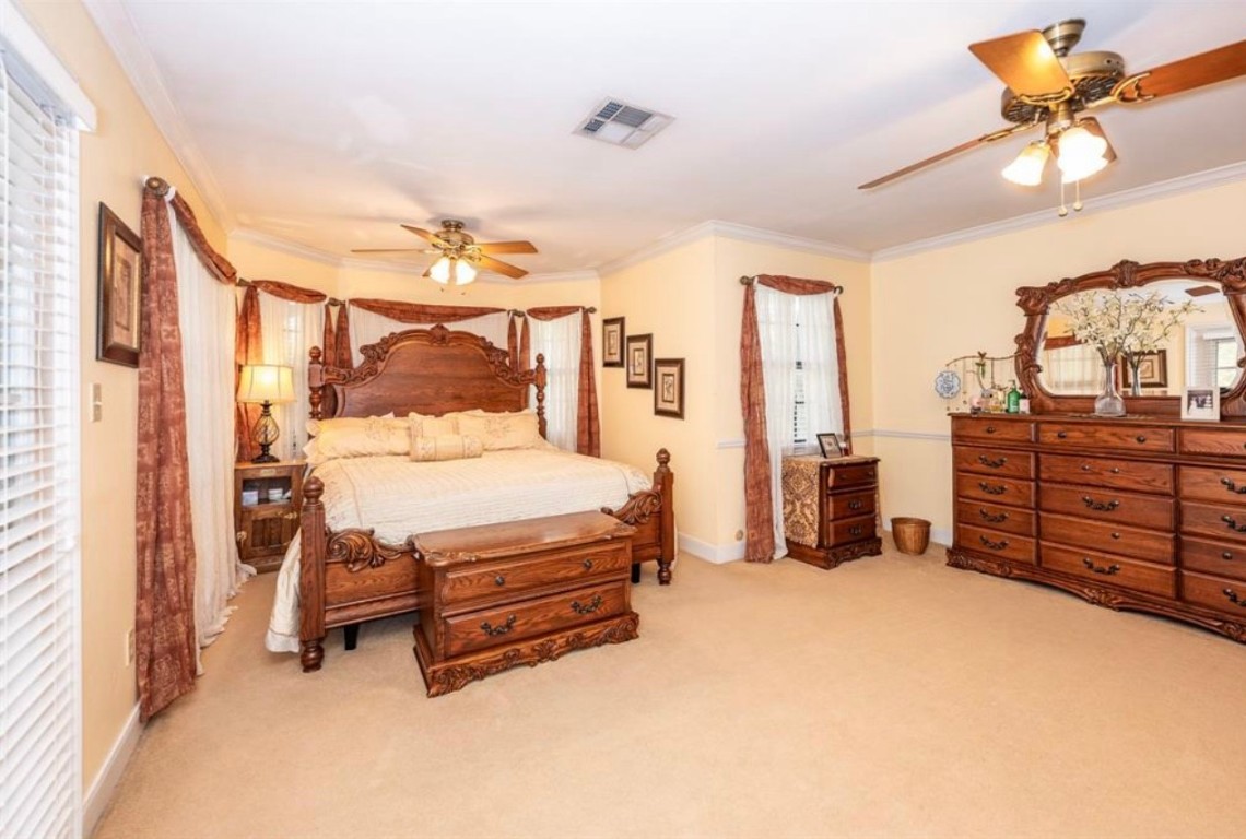 464 River Road Angleton, TX 77515 - Photo 16 of 45 a bedroom with furniture and natural light