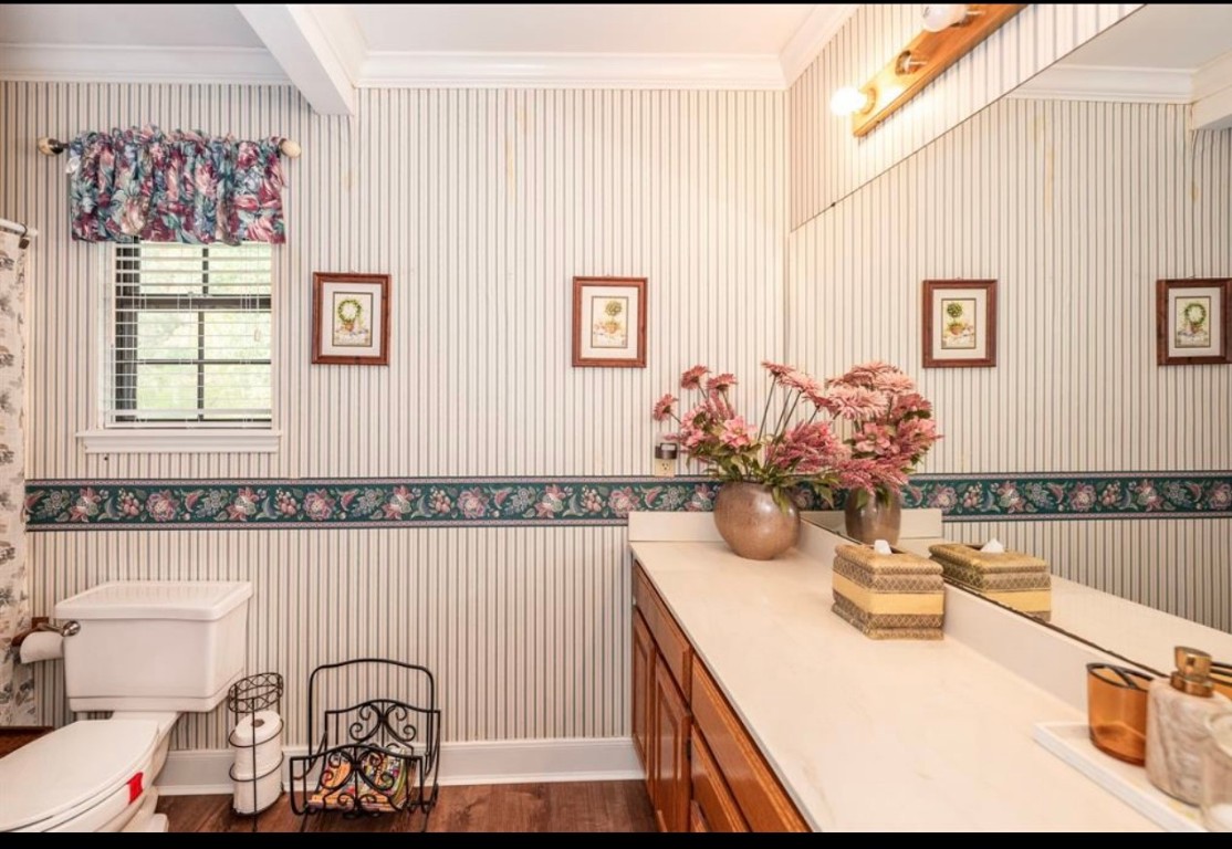 464 River Road Angleton, TX 77515 - Photo 20 of 45 a bathroom with a sink mirror and vanity