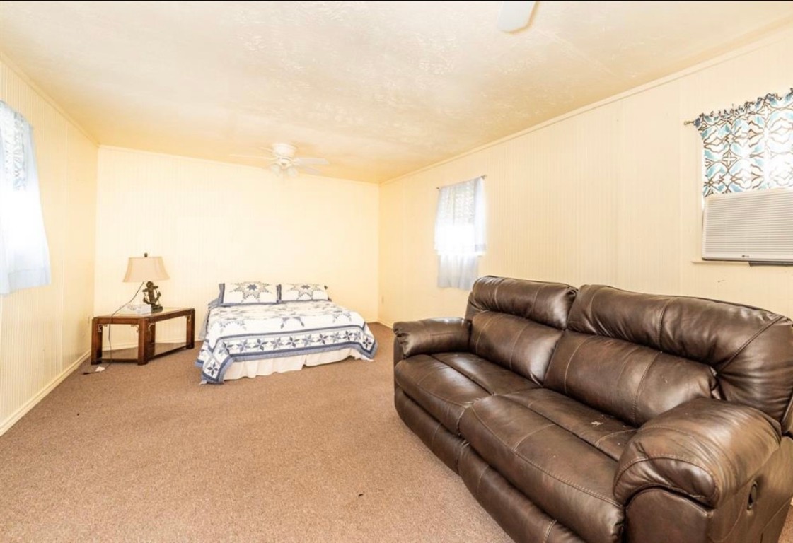464 River Road Angleton, TX 77515 - Photo 23 of 45 a living room with furniture and a table
