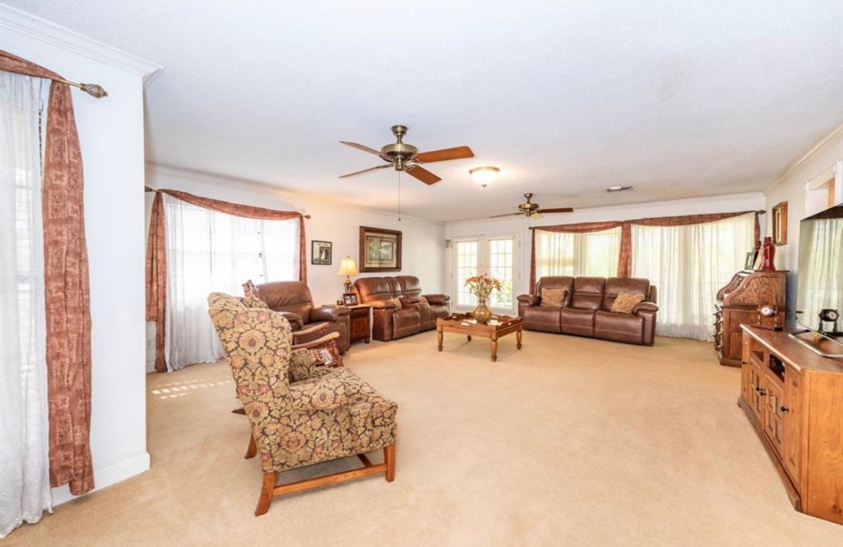 464 River Road Angleton, TX 77515 - Photo 5 of 45 a living room with furniture and a large window