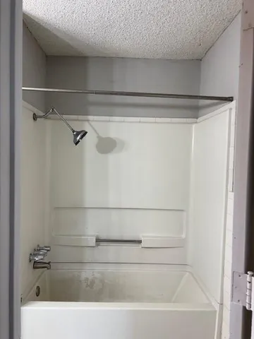 a bathroom with a bathtub