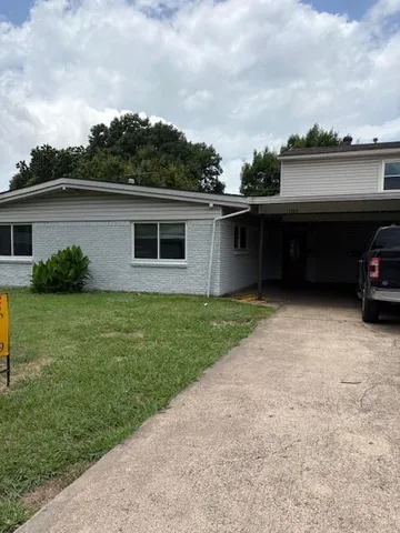 a view of a terrace with a garden