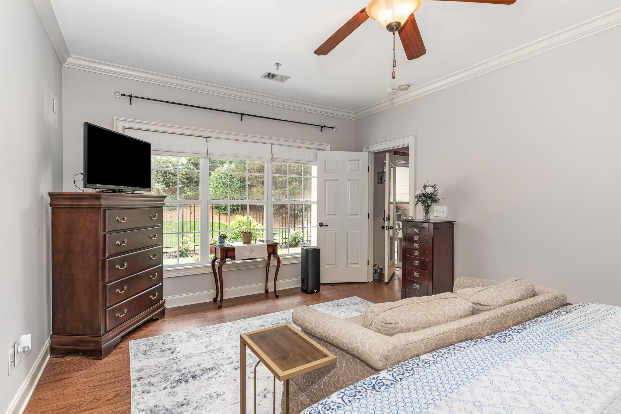 4229 Prestwick Place Spring Hill, TN 37174 - Photo 17 of 29 a bedroom with a bed and a television