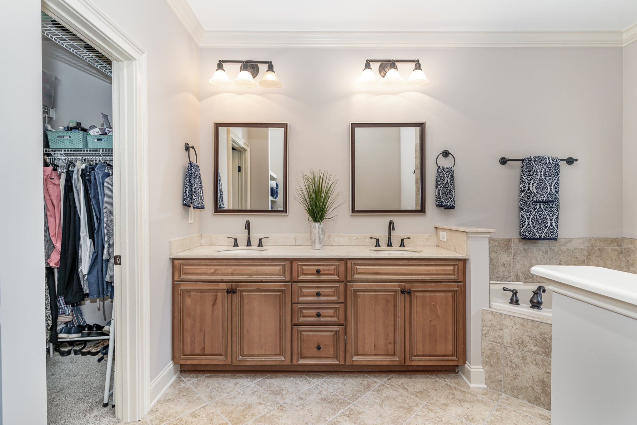 4229 Prestwick Place Spring Hill, TN 37174 - Photo 20 of 29 a bathroom with a double vanity sink and a mirror