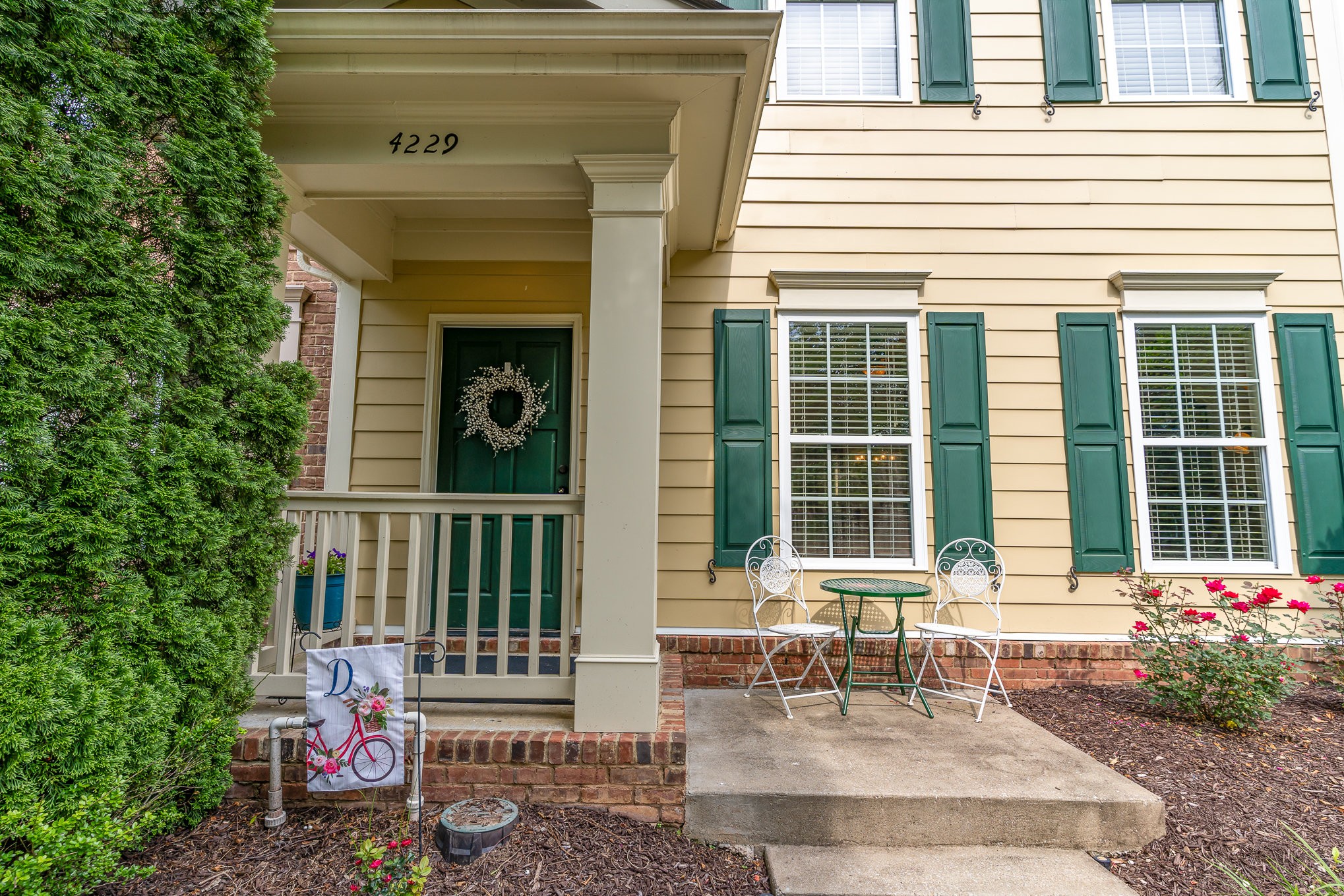 4229 Prestwick Place Spring Hill, TN 37174 - Photo 4 of 29 a front view of a house with outdoor seating