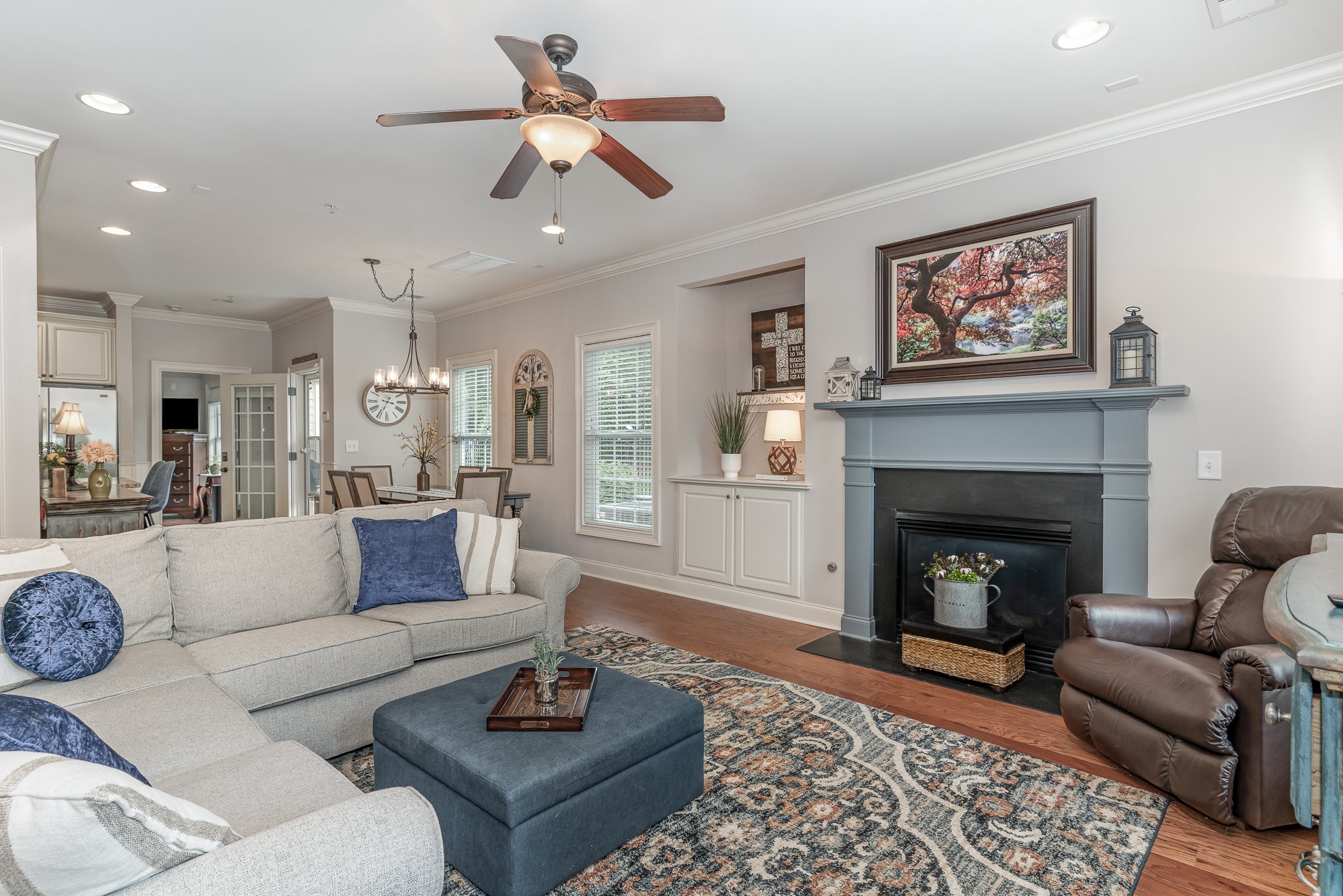 4229 Prestwick Place Spring Hill, TN 37174 - Photo 6 of 29 a living room with furniture and a fireplace
