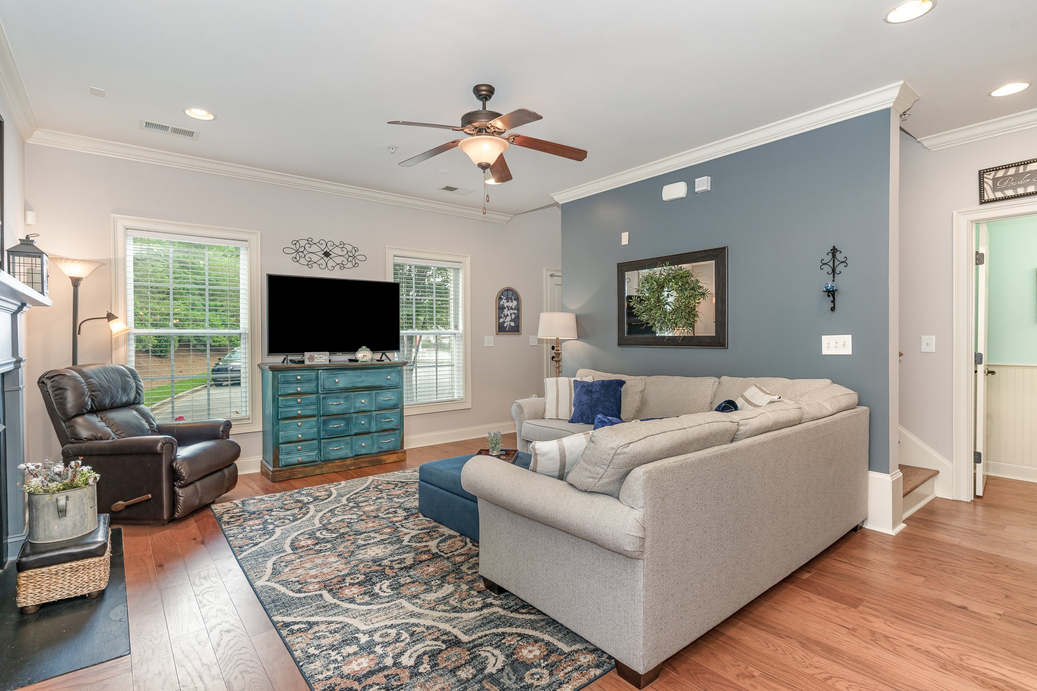 4229 Prestwick Place Spring Hill, TN 37174 - Photo 7 of 29 a living room with furniture and a flat screen tv