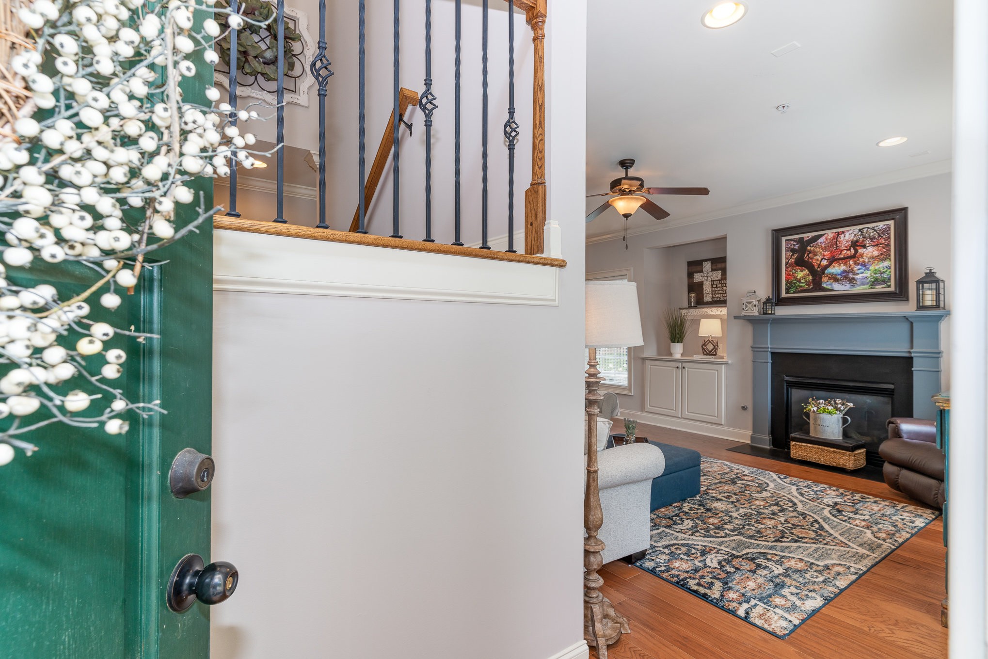 4229 Prestwick Place Spring Hill, TN 37174 - Photo 9 of 29 a living room with furniture and a fireplace