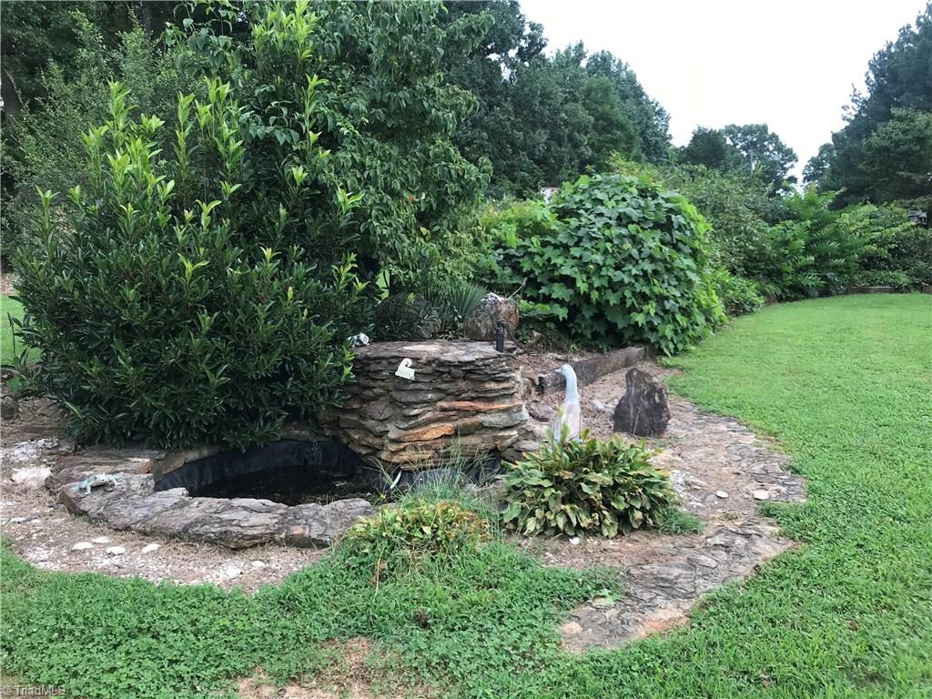 1143 Cool Springs Church Road Elkin, NC 28621 - Photo 7 of 24 Mature landscaping