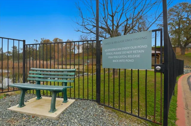 a view of a chair with wooden fence