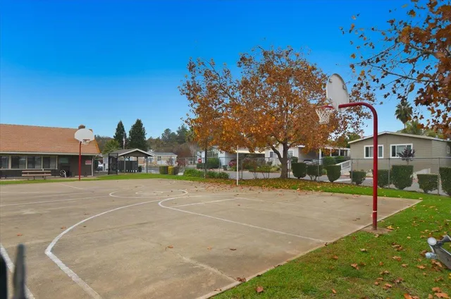 a front view of a building with a yard