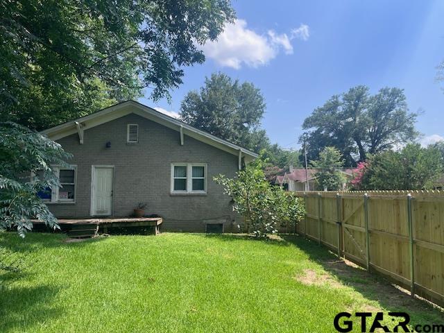 617 West Dobbs Street Tyler, TX 75701 - Photo 19 of 19 a front view of a house with garden