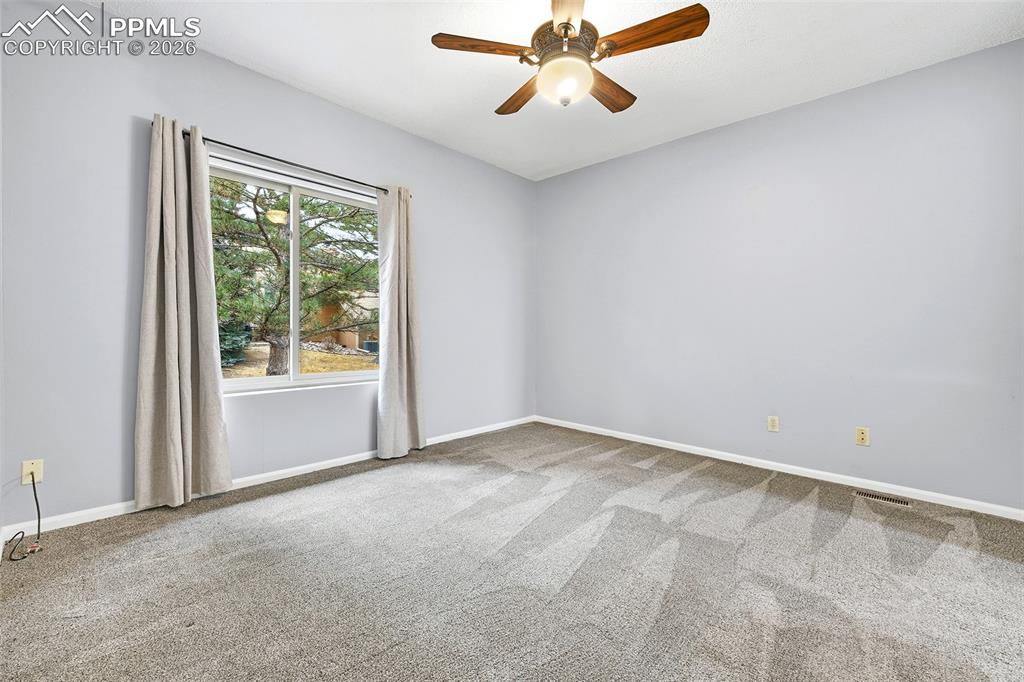 365 Autumn Ridge Circle, Unit A Colorado Springs, CO 80906 - Photo 18 of 30 The second en-suite bedroom with ...