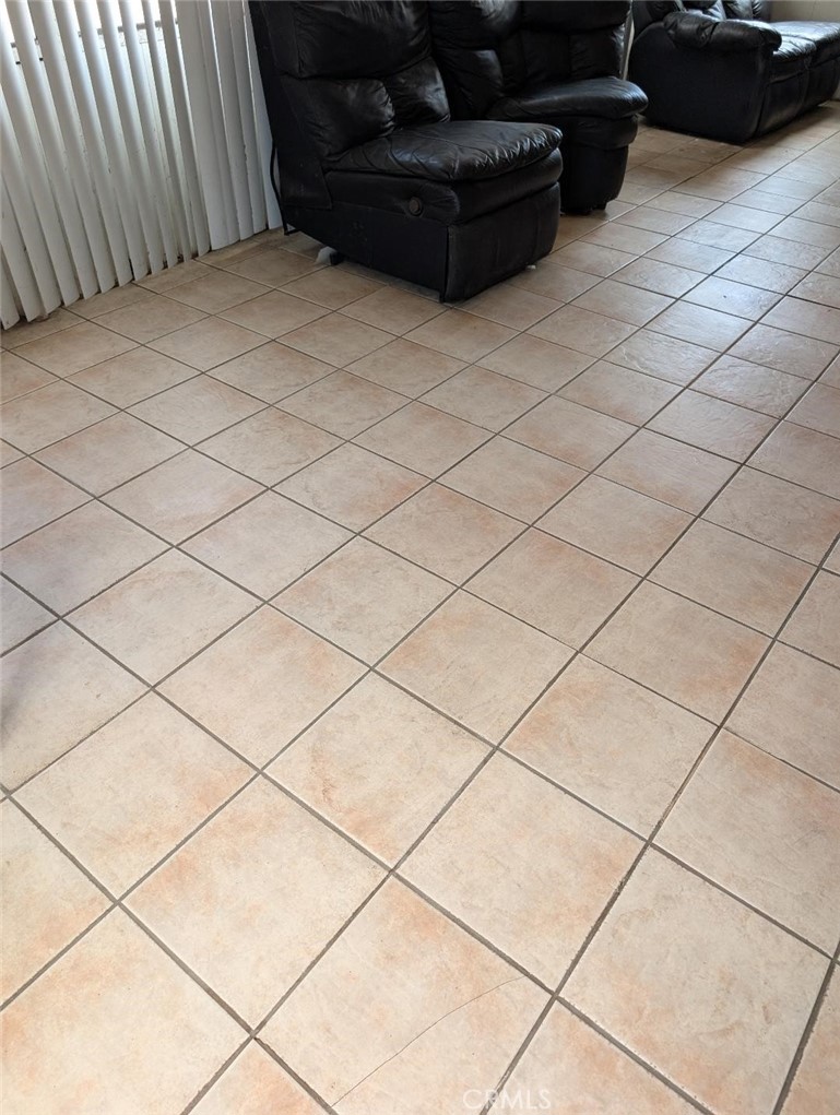 1619 West 136th Street Compton, CA 90222 - Photo 8 of 10 a living room with a couch