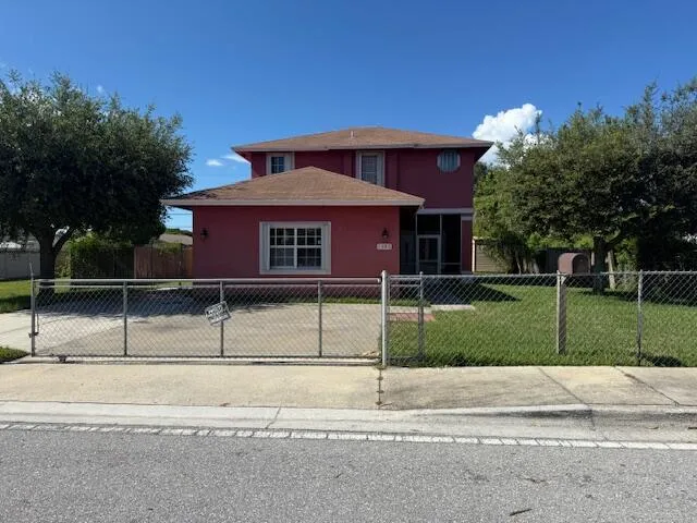 a front view of a house with a porch