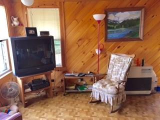 633 Big Boyd Lake Road Milo, ME 04463 - Photo 8 of 11 Front living room area