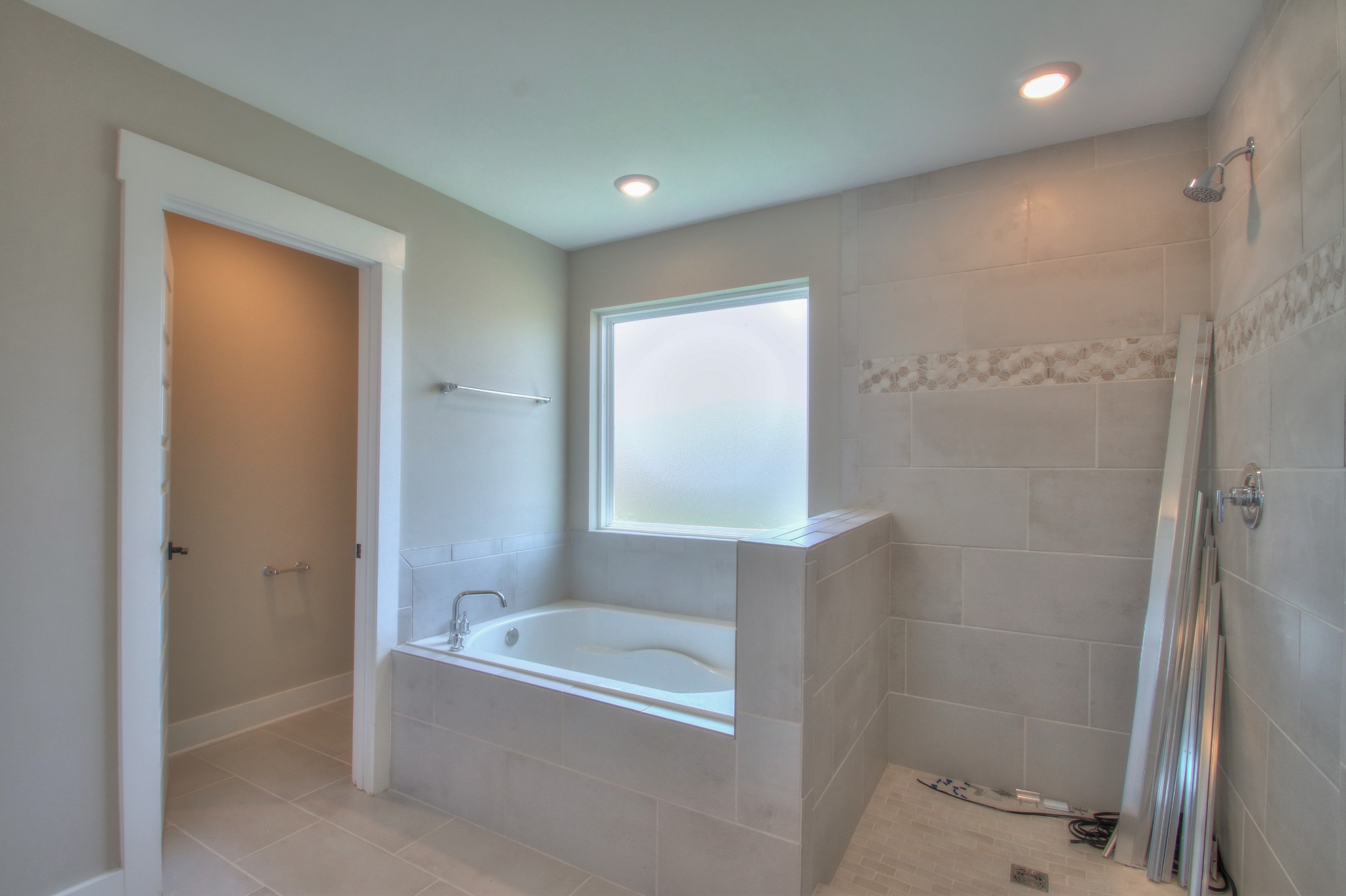 333 Collier Road Mount Juliet, TN 37122 - Photo 54 of 57 a bathroom with a tub and shower