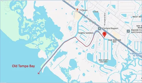 a close up of a flower pot with a book