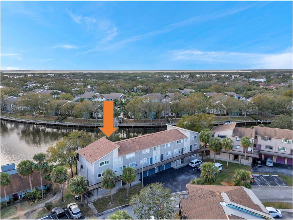 6311 Newtown Circle, Unit 11B1 Tampa, FL 33615 - Photo 45 of 49 a view of a lake with houses