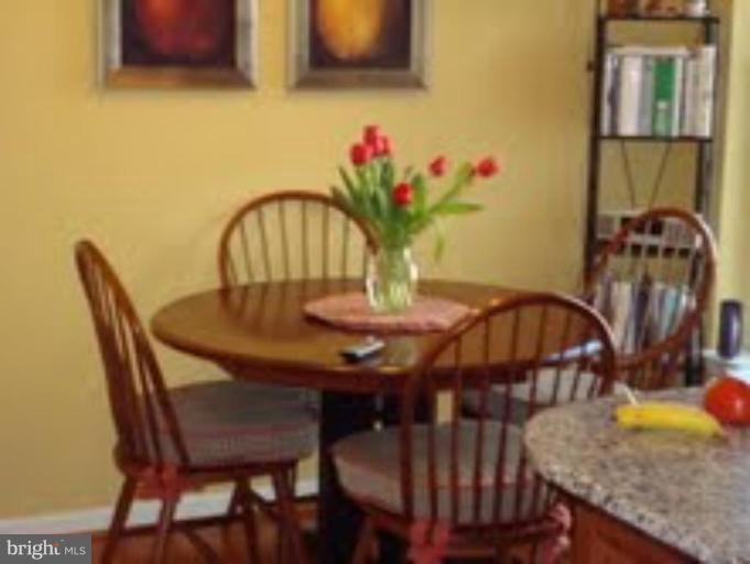 721 Runabout Loop, Unit 721 Solomons, MD 20688 - Photo 10 of 23 a view of a dining room with furniture