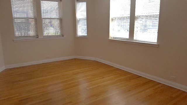 58 Forest Avenue, Unit G Riverside, IL 60546 - Photo 5 of 19 an empty room with a window