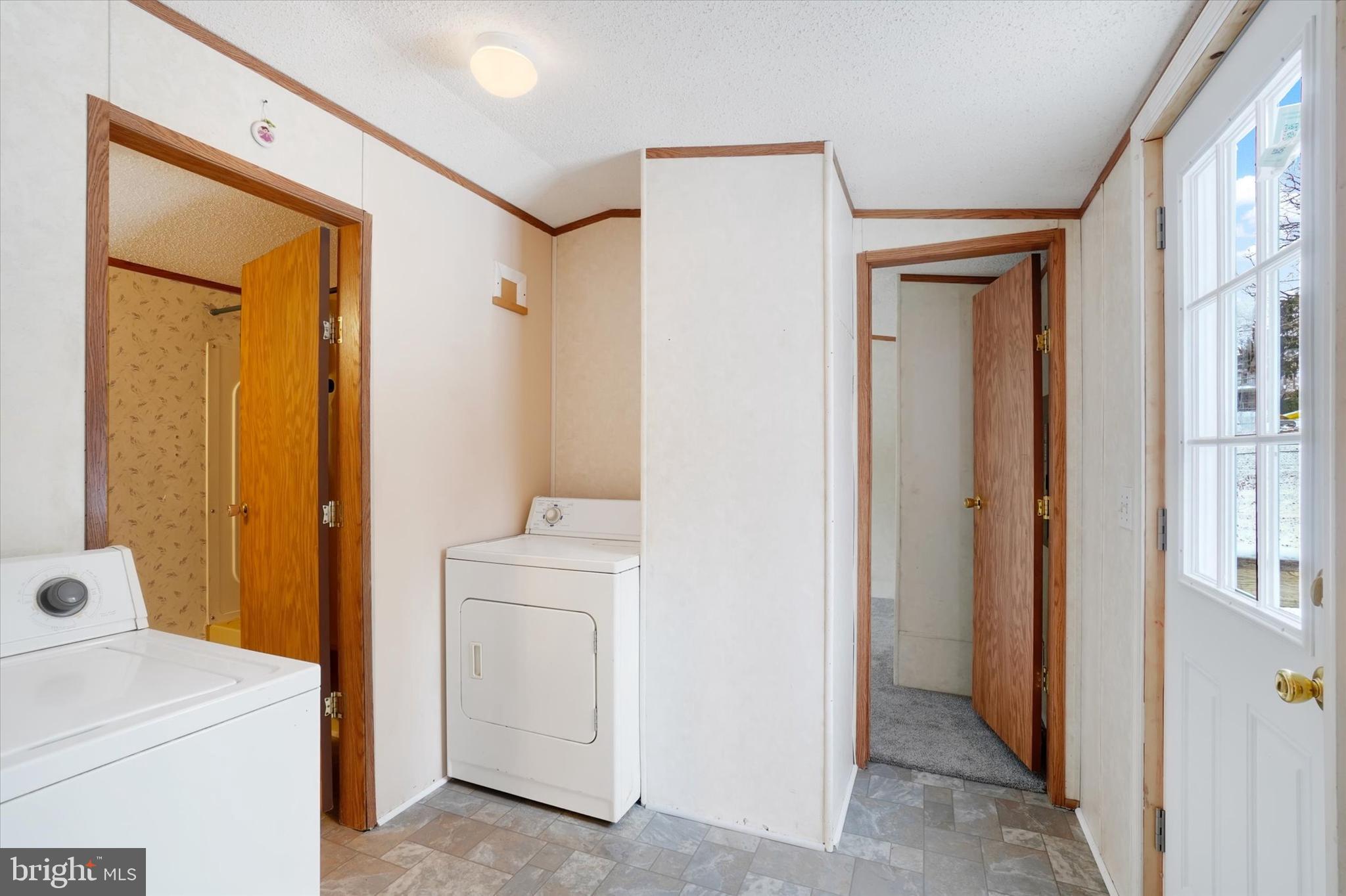 40 Stevens Road Etters, PA 17319 - Photo 12 of 19 a view of bathroom with a sink a mirror and a washer