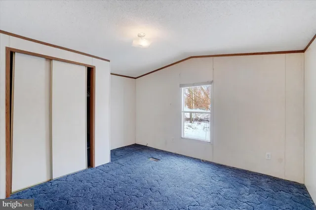 a view of empty room with windows