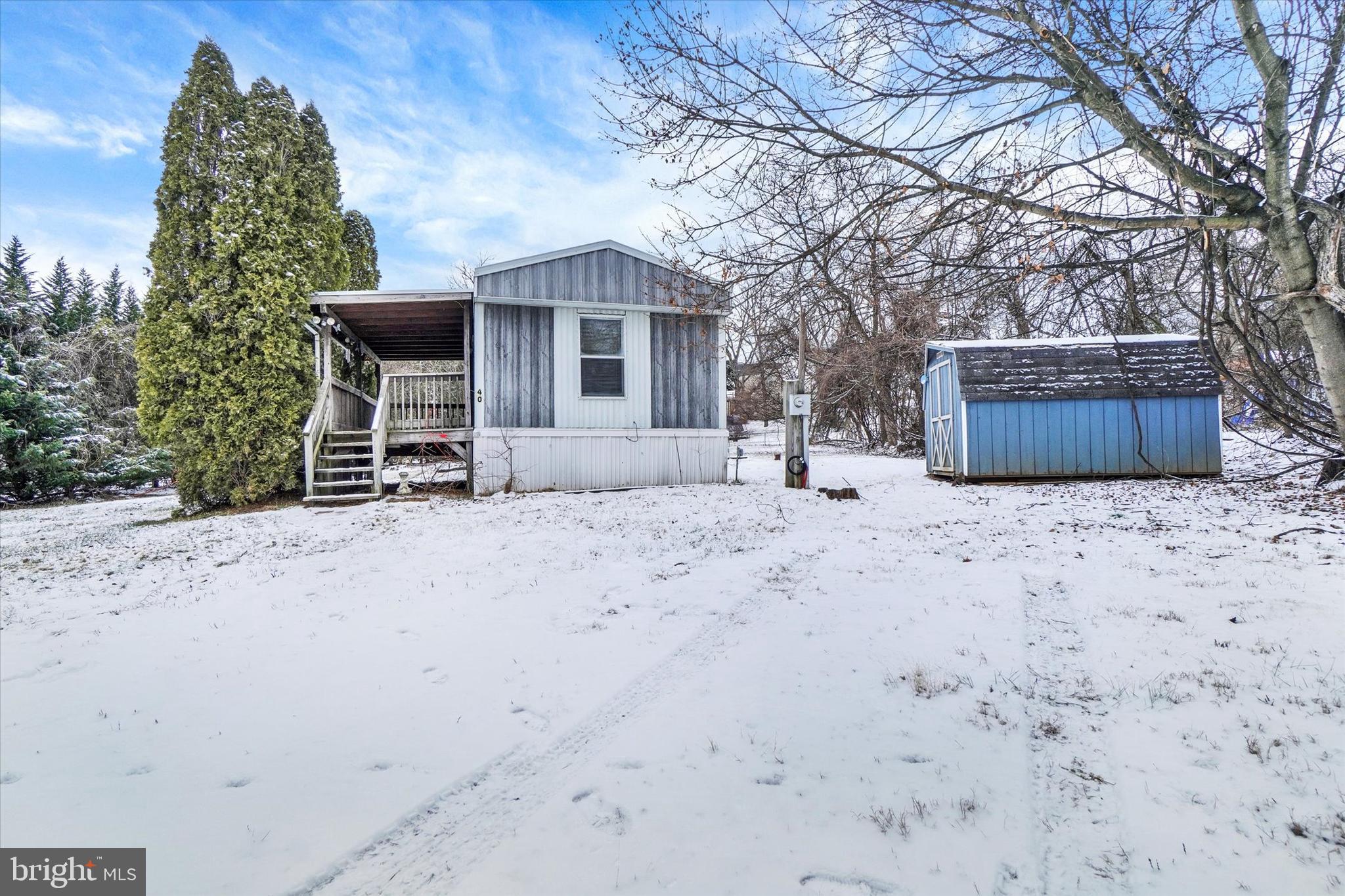 40 Stevens Road Etters, PA 17319 - Photo 2 of 19 a view of a house with a yard covered in snow