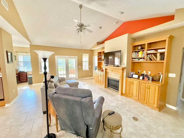 a kitchen that has a sink and a large window