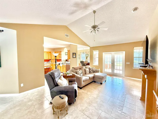 a large kitchen with a large window